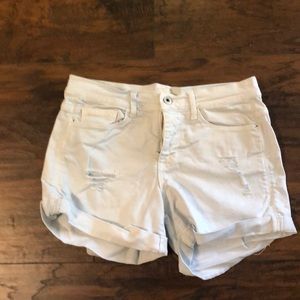 White distressed shorts